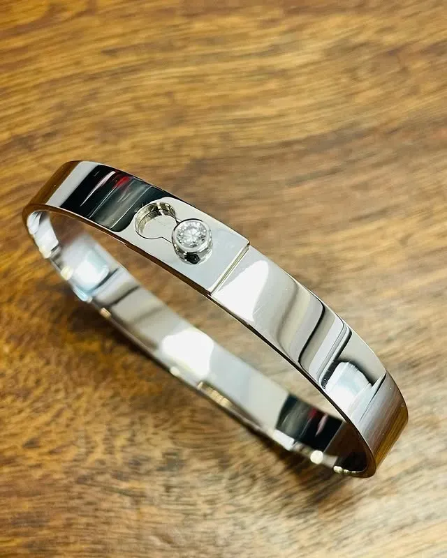 Bracelet serrure or blanc palladié